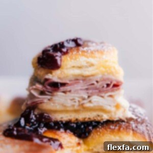 Beautifully baked Monte Cristo Sliders, ready to serve.