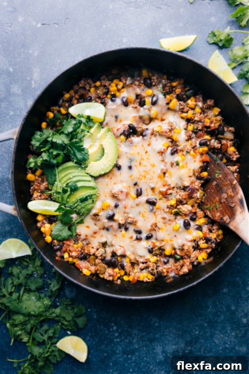 Up-close overhead image of the Green Chile Ground Turkey, showcasing the melted cheese and vibrant ingredients