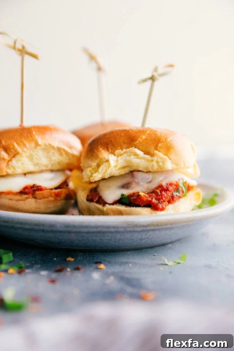 Delicious crockpot meatball sliders on a plate, ready to be enjoyed