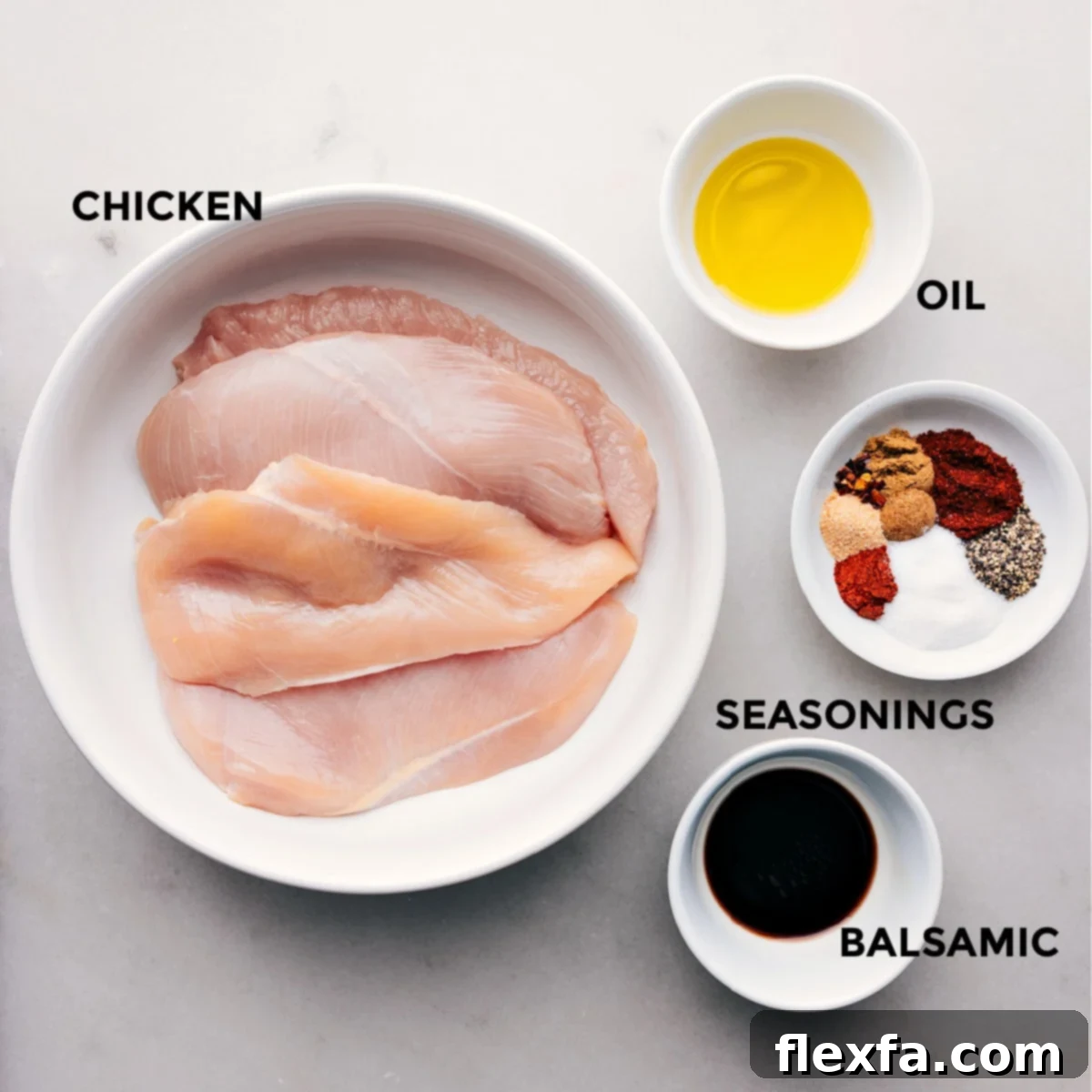 All the vibrant ingredients for the blackened chicken recipe prepped and ready for easy assembly on a wooden board.