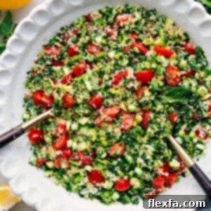 A prepared bowl of fresh and vibrant Tabouli salad, ready to be served.