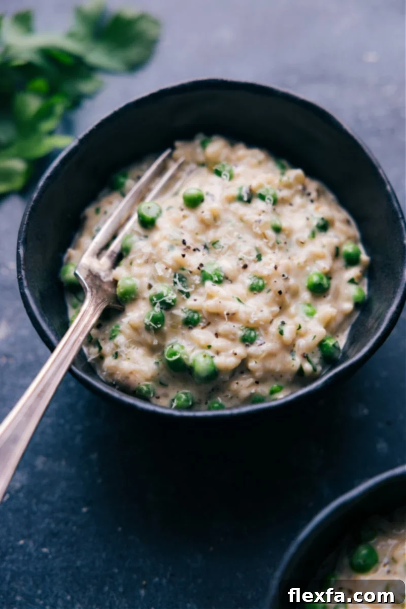 Classic Instant Pot Risotto ready to serve A beautifully presented bowl of creamy Instant Pot Risotto, garnished with fresh herbs and Parmesan cheese, viewed from overhead.