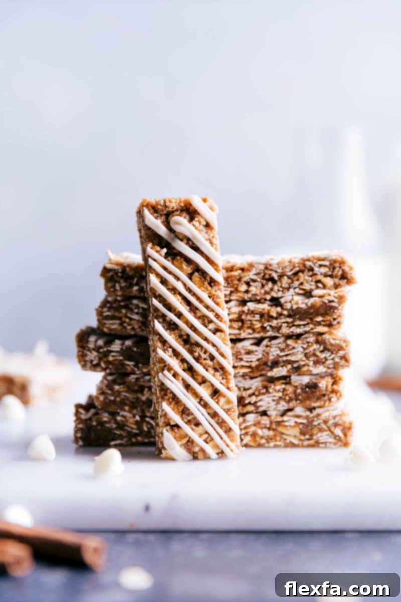 Close-up of a glazed oatmeal granola bar, showcasing the sweet white chocolate icing