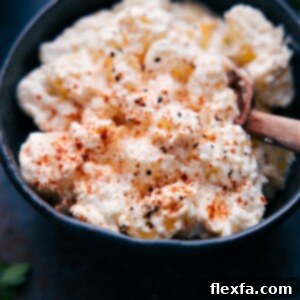 A delicious bowl of Creamed Potatoes, a rich, velvety twist on classic mashed potatoes.