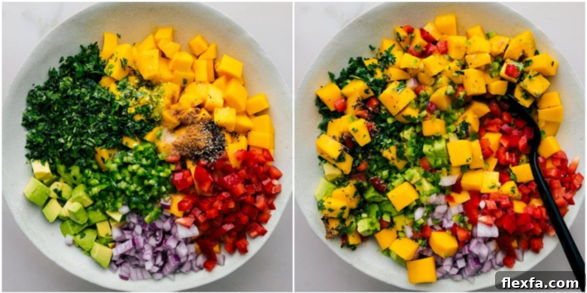 A large bowl filled with freshly prepared mango avocado salsa, featuring vibrant diced mango, creamy avocado, red onion, cilantro, and lime juice, ready to be served.