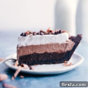 A top-down view of the No-Bake Chocolate Pudding Pie, showcasing its rich, dark chocolate layers and whipped topping, ready to be chilled.