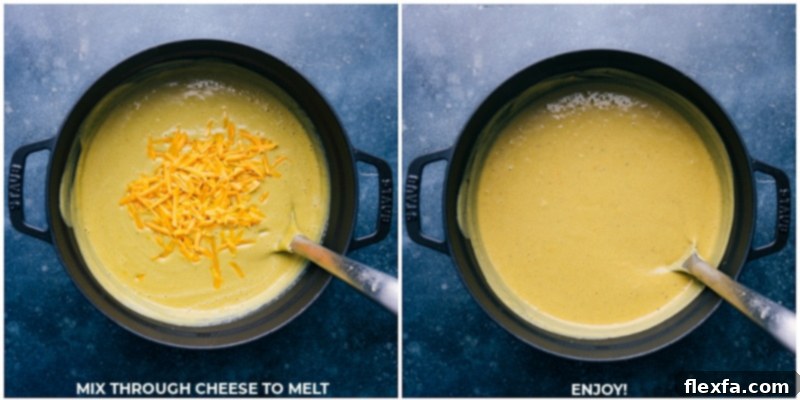 Close-up process shot of shredded sharp cheddar cheese being stirred into the smooth, creamy broccoli soup, melting beautifully to create a rich, uniform consistency.