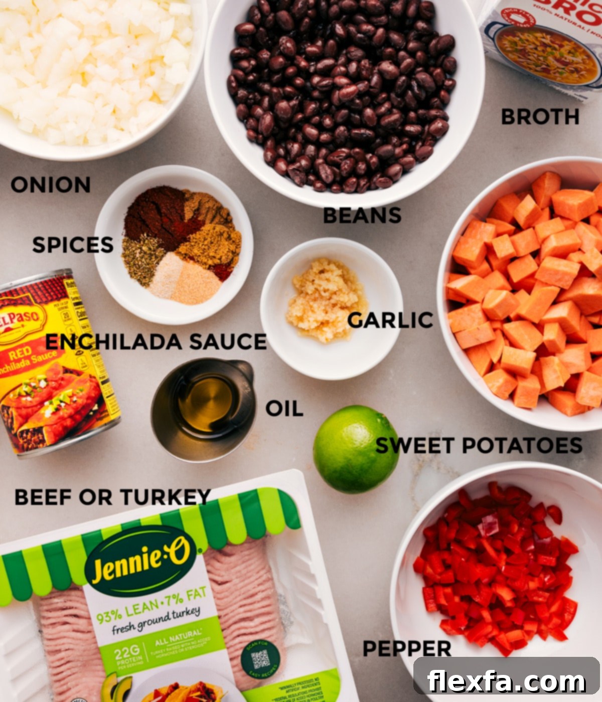 Ingredients For Beef Enchilada Soup All the fresh and pantry ingredients laid out and prepped for cooking: diced onions, vibrant red pepper, cubed sweet potatoes, minced garlic, an array of spices, a can of red enchilada sauce, chicken broth, black beans, and lean ground meat.