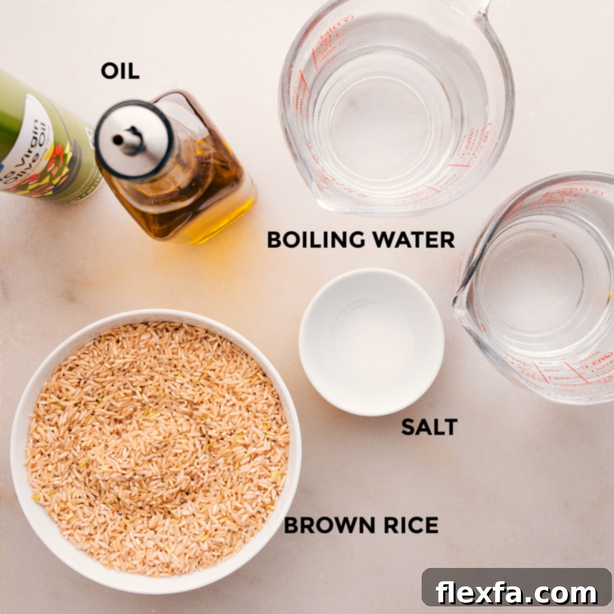 Essential ingredients for this easy oven-baked brown rice recipe: rice, salt, boiling water, and a touch of oil.
