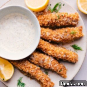 Crispy homemade fish sticks, golden brown and perfectly cooked, ready to be served.