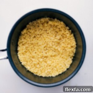 Finished couscous dish presented in a bowl, ready to serve.
