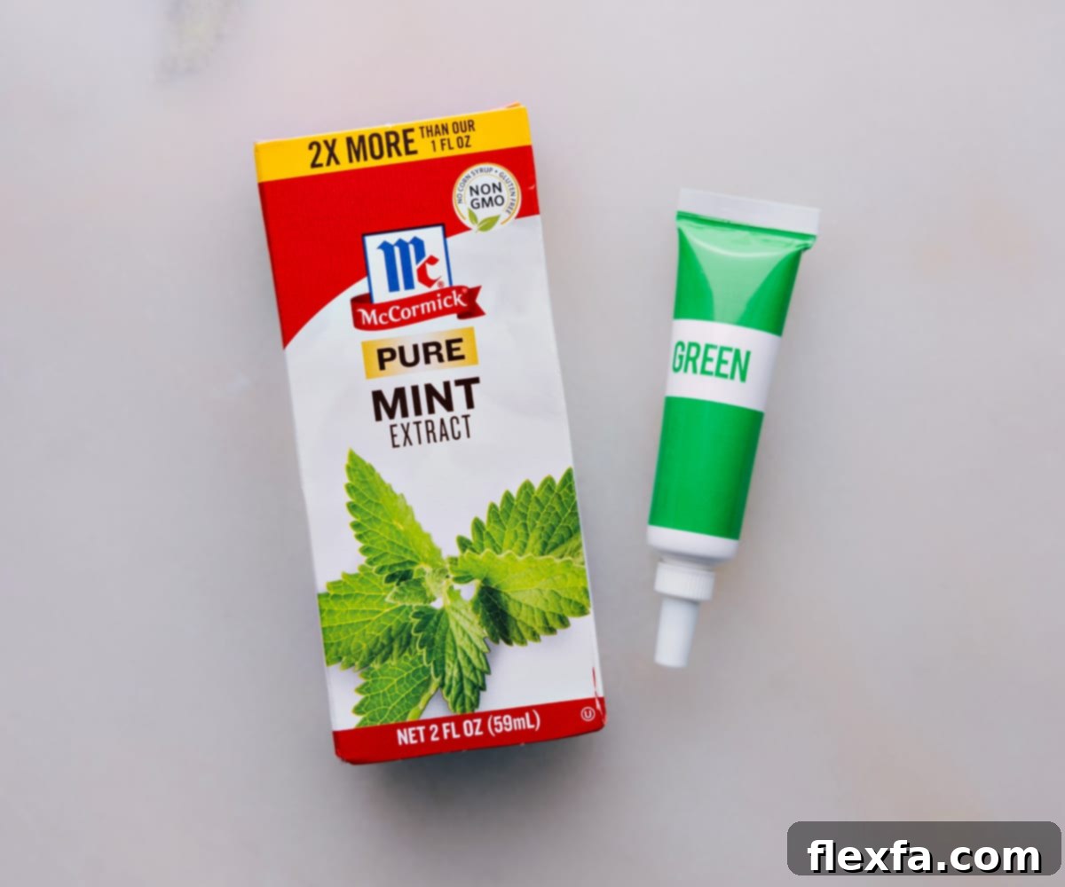 Mint extract and green food dye being added to the Shamrock Shake ingredients.