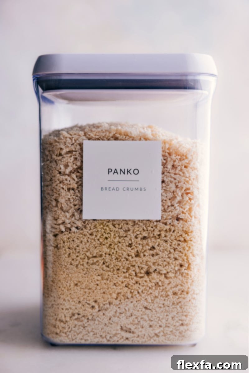 A large container of Panko breadcrumbs shown on a kitchen counter, ready for cooking