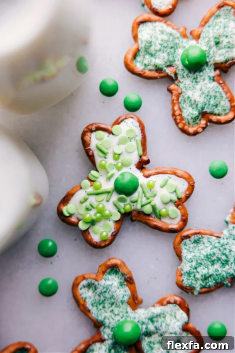 A beautiful close-up, overhead shot of a single Pretzel Shamrock, highlighting its intricate design and vibrant green candy.