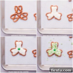 Melted white chocolate being smoothed into the center of pretzel twists arranged like a shamrock.
