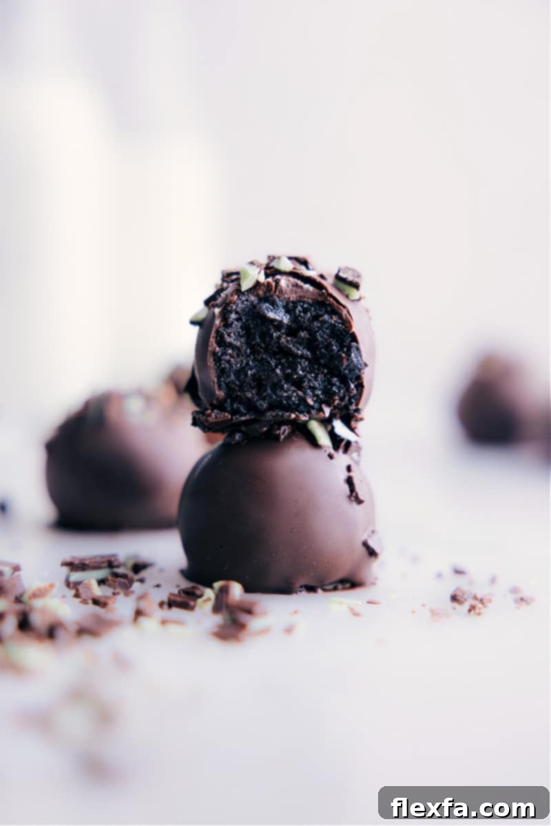 A beautifully composed image of Mint Oreo Truffles stacked on top of each other, ready to be enjoyed.