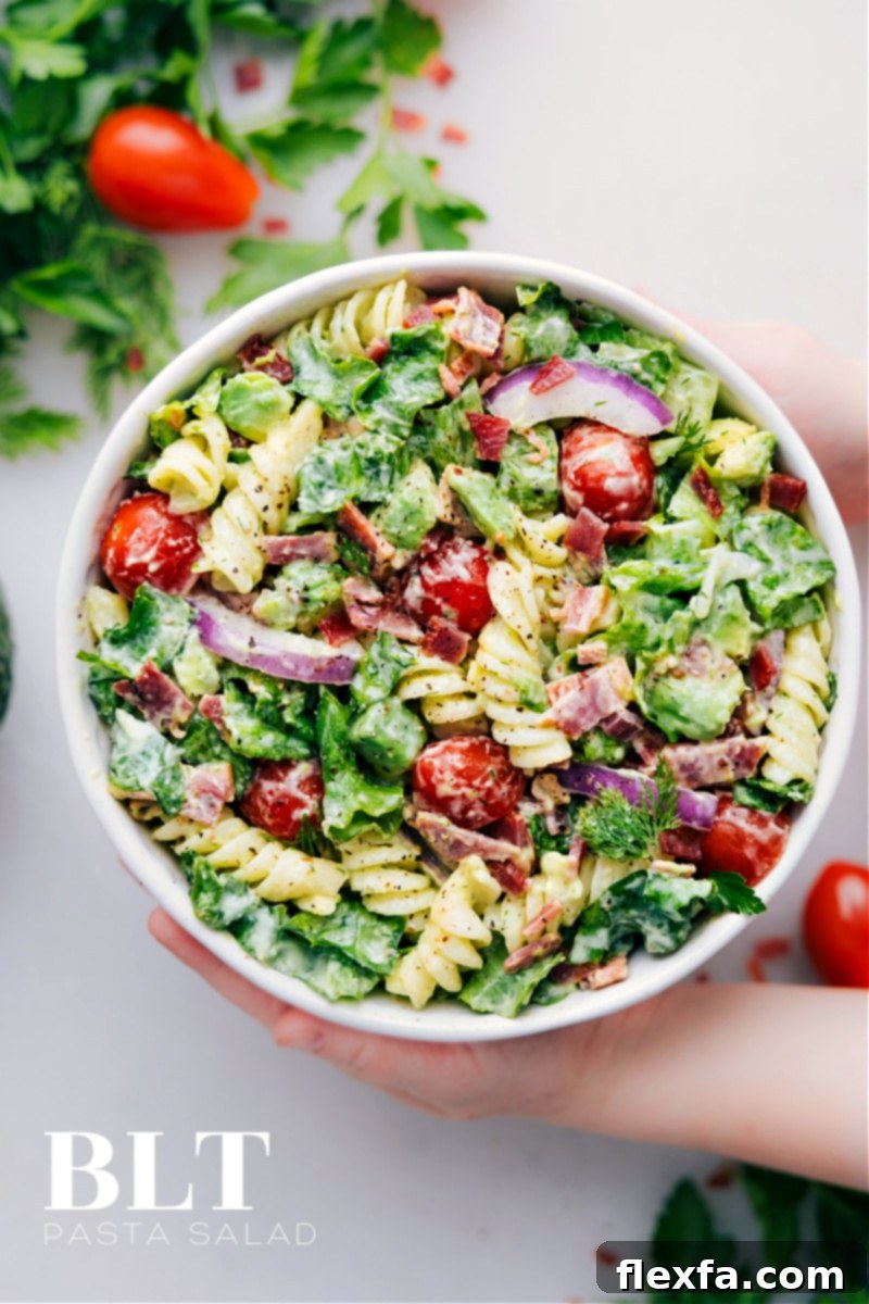 Overhead image of BLT Pasta Salad, showcasing its vibrant ingredients like crispy bacon, cherry tomatoes, and creamy avocado.