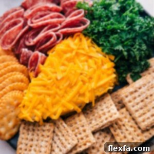 Close-up image of the Carrot Cheeseball with curly parsley, ready to be served