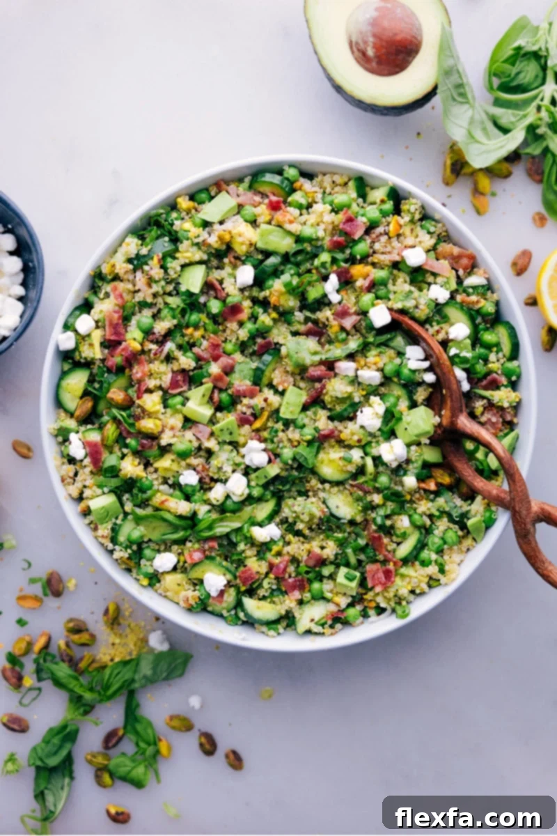 Overhead image of the vibrant and fresh Herbalicious Quinoa Salad, showcasing all its colorful ingredients, ready to be enjoyed.