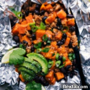 A perfectly cooked Taco Sweet Potato Foil Packet, opened and ready to eat.