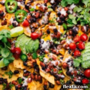 Close-up of baked Vegetarian Nachos with melted cheese