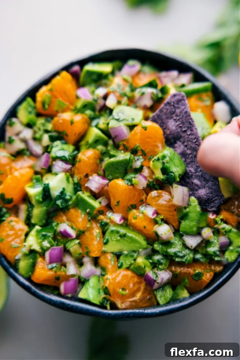 Close-up of Avocado-Orange Salsa showing the vibrant colors and chunky texture, ready for serving.