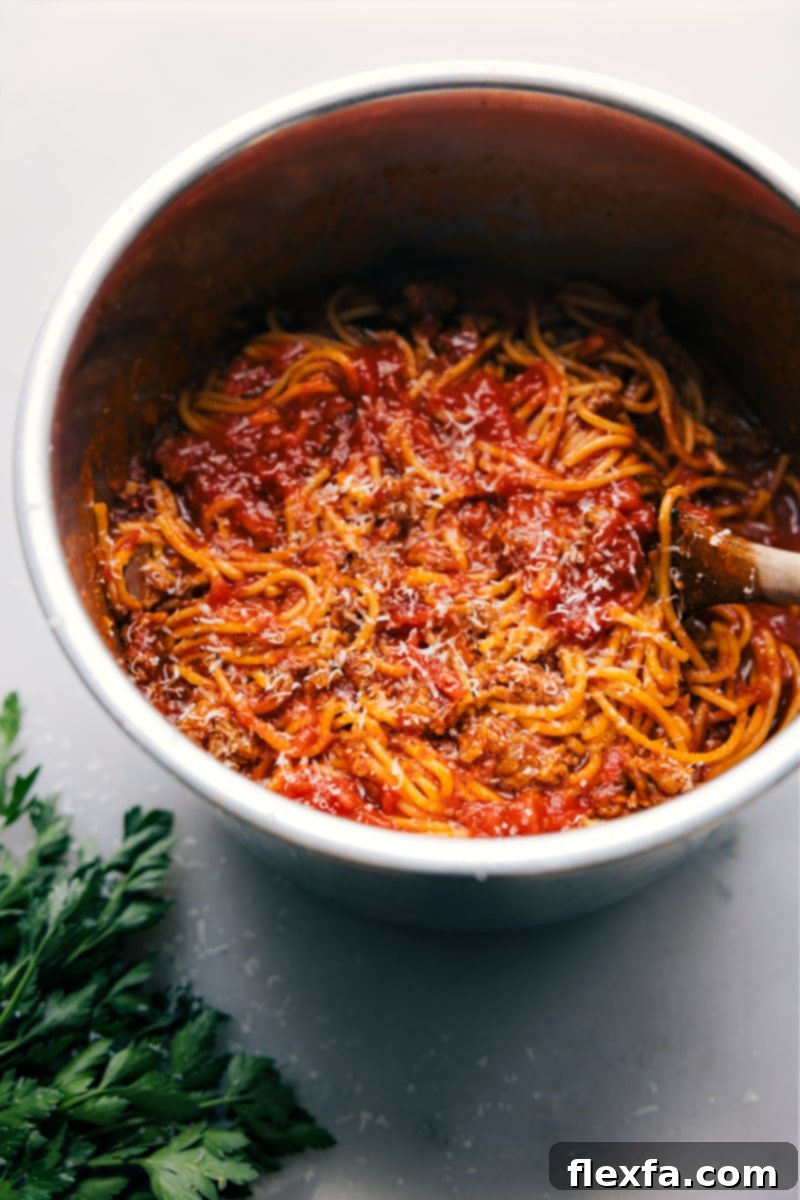 Overhead shot of the Instant Pot Spaghetti in the pot, ready for serving, showcasing its rich color and inviting texture.