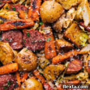 A delicious image of the completed One Pan Cabbage, Potatoes, and Sausage dish.