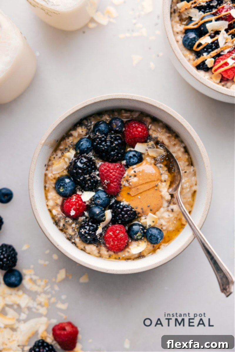 Instant Pot Oatmeal with Berries in a Bowl - A Delicious & Healthy Breakfast A steaming bowl of Instant Pot Steel-Cut Oatmeal topped with a vibrant medley of fresh berries.