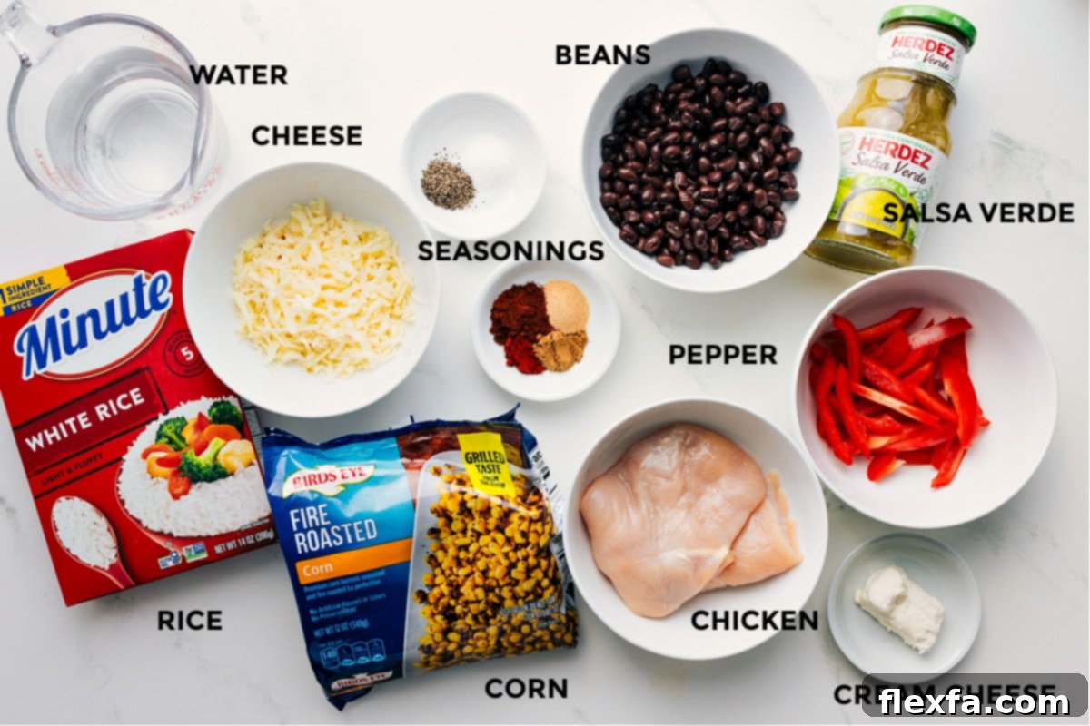 Ingredients Chicken Rice Foil Packs All the ingredients prepped and ready for easy assembly, including water, rice, cheese, corn, spices, beans, chicken, salsa verde, cream cheese, and peppers.