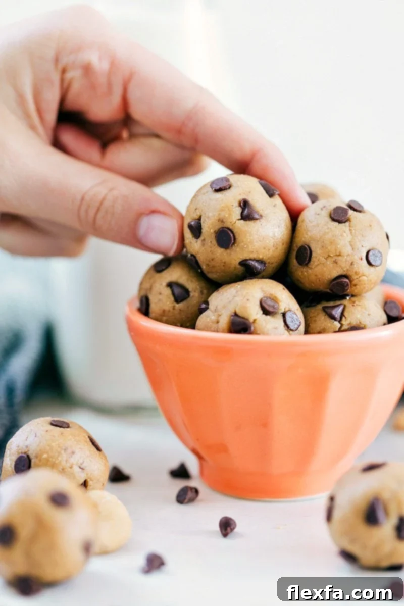 Delicious and healthy No-Bake Energy Bites speckled with chocolate chips, ready for a quick snack.