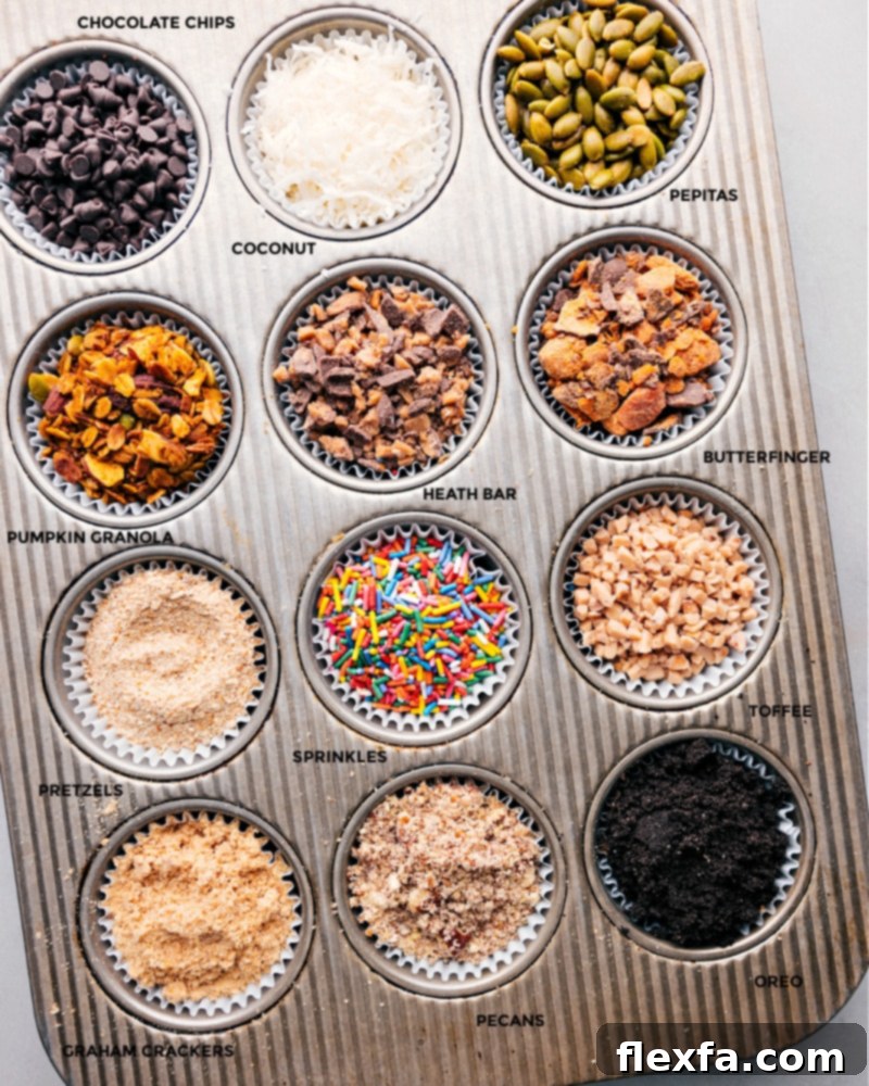 An organized display of diverse toppings, from nuts to sprinkles, arranged in muffin tins for an inviting Caramel Apple Bar.