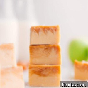 Close-up of three pieces of Caramel Apple Fudge, perfectly swirled and ready to enjoy.