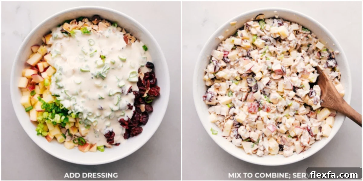 Creamy dressing being poured over diced chicken, crisp apples, and crunchy almonds, ready to be mixed together into a delightful chicken salad.