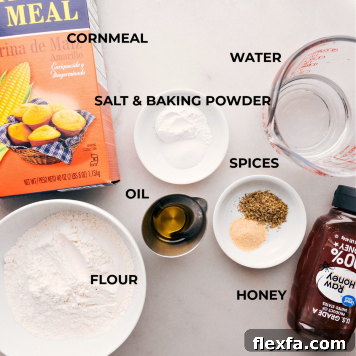 Ingredients laid out for making No-Yeast Pizza Dough, including flour, baking powder, salt, olive oil, honey, and water, neatly arranged on a counter.