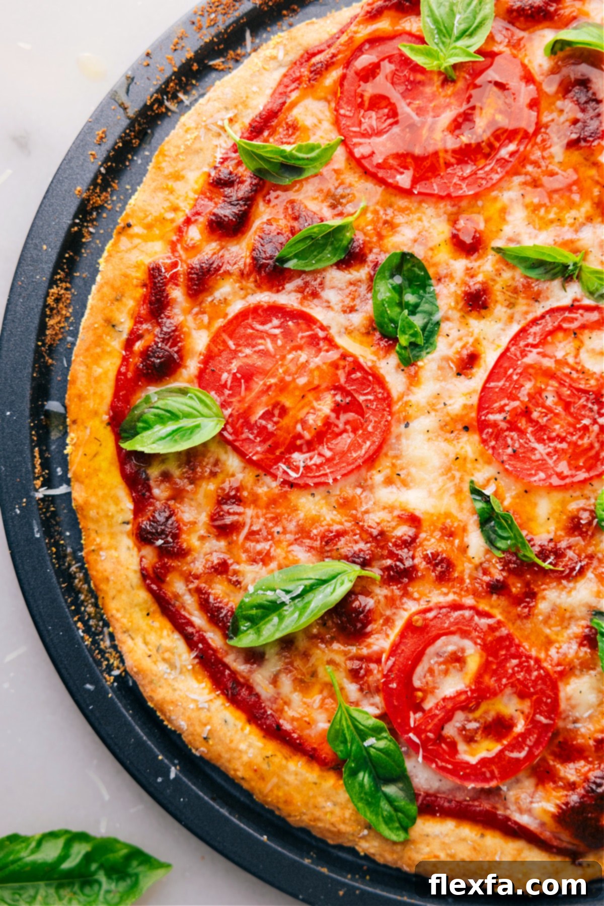 Overhead view of a pizza made with No-Yeast Pizza Dough, showcasing a vibrant, fully topped pizza with a golden crust.