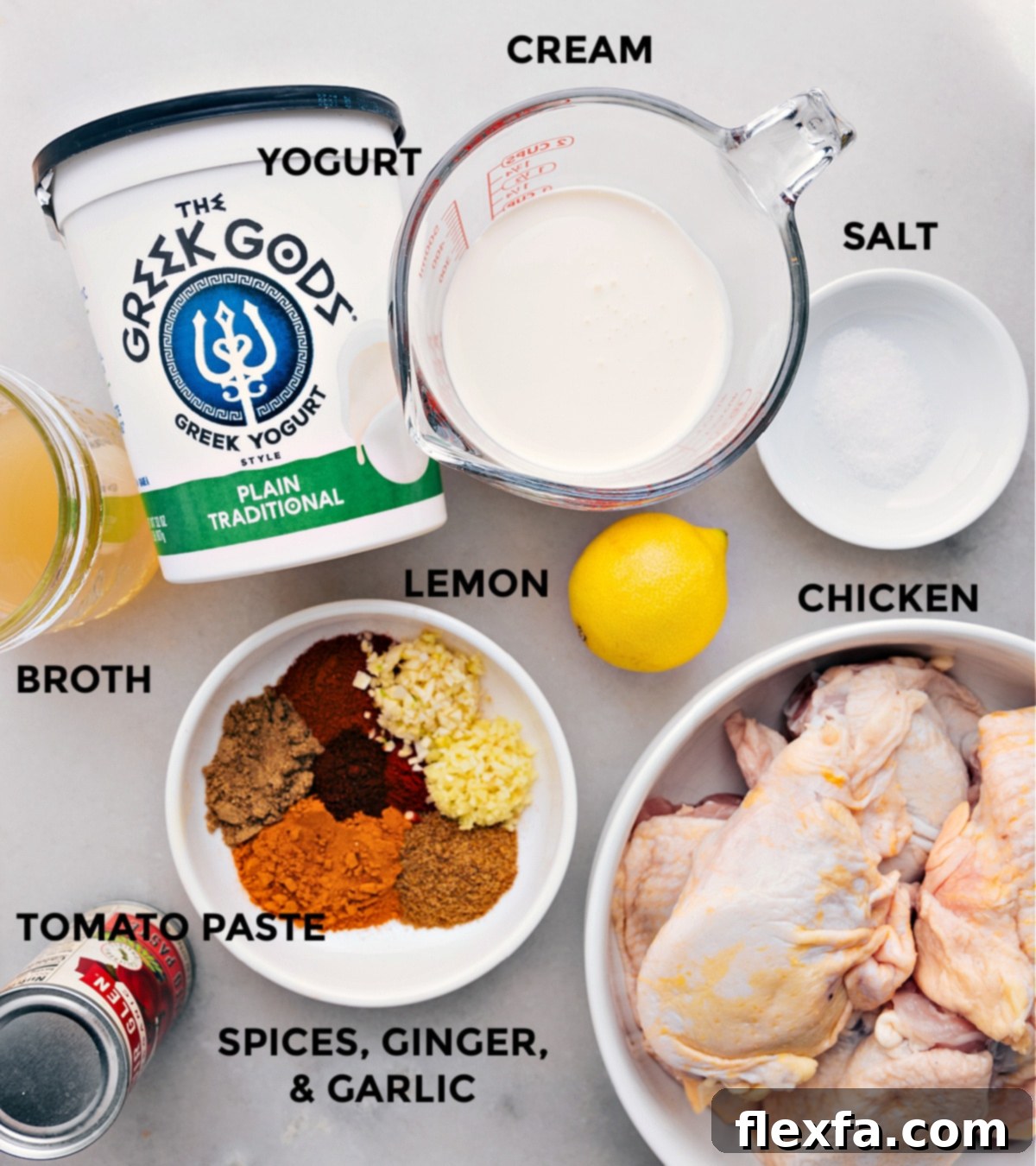 Ingredients used for the recipe including chicken, spices, yogurt, cream, and more.