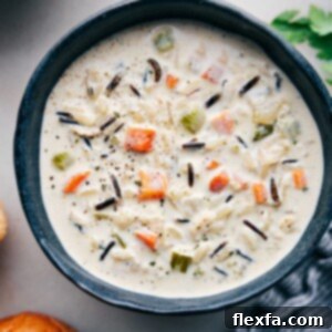 Creamy Chicken and Wild Rice Soup in a bowl ready to be enjoyed.