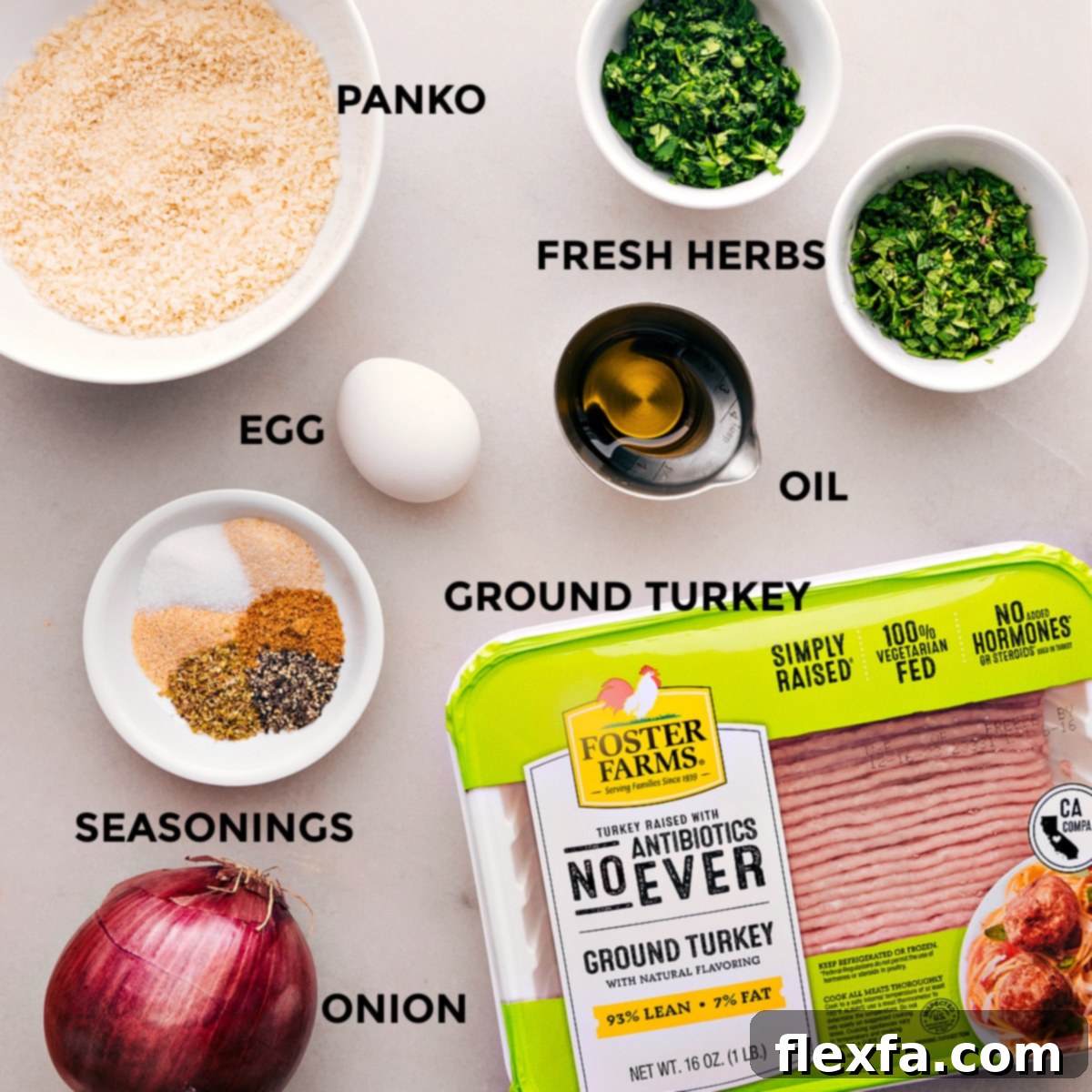 Ingredients In Greek Turkey Meatballs All the fresh ingredients for Greek Turkey Meatballs prepped and laid out on a cutting board, ready for mixing.