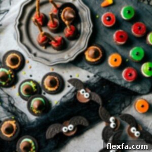 A festive image showcasing all four easy Halloween treats together on a serving tray.