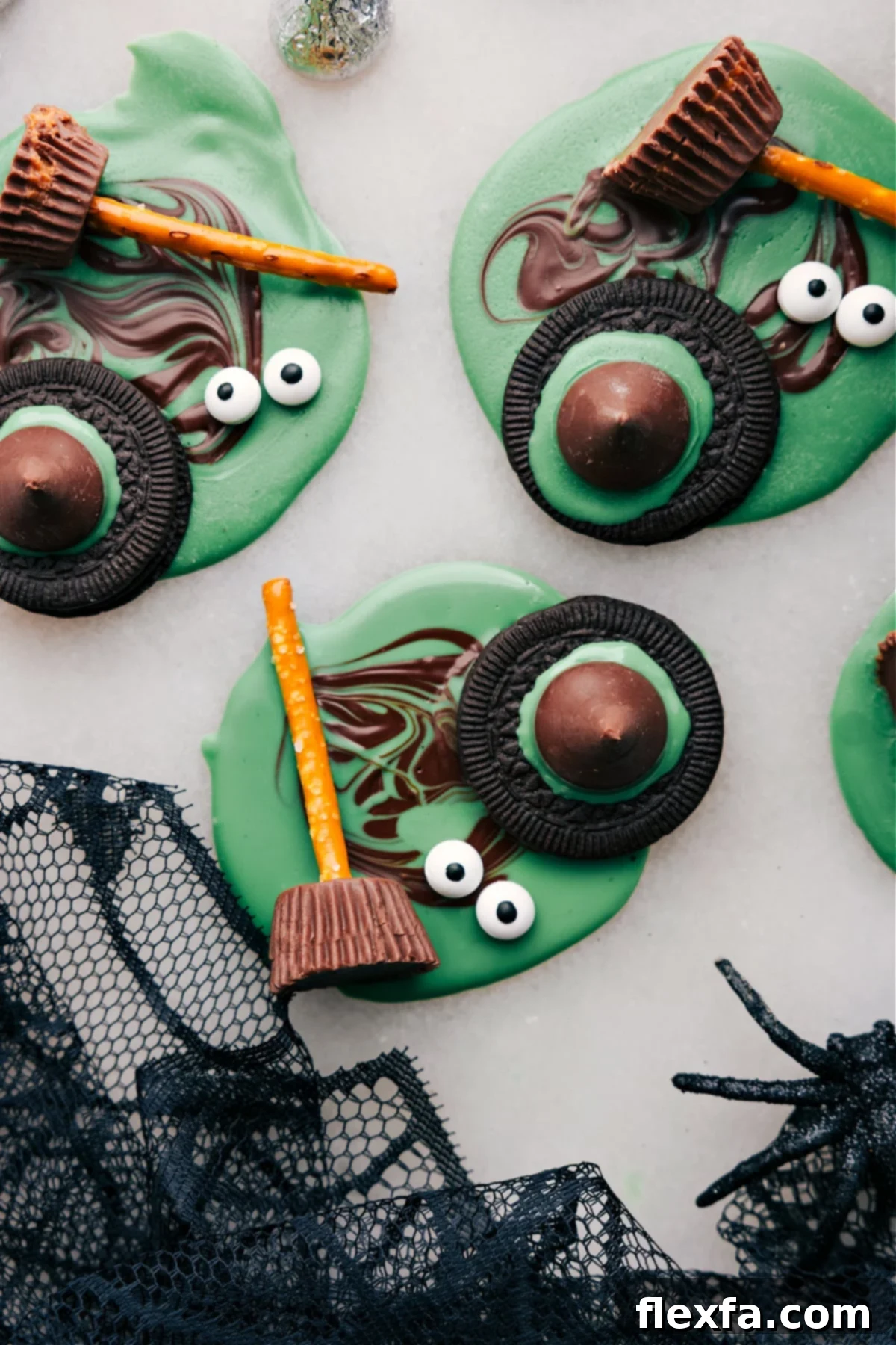 An assortment of all four easy Halloween treats: Monster Eyeballs, Witch's Hats, Witch's Brooms, and Bat Bites, beautifully arranged.