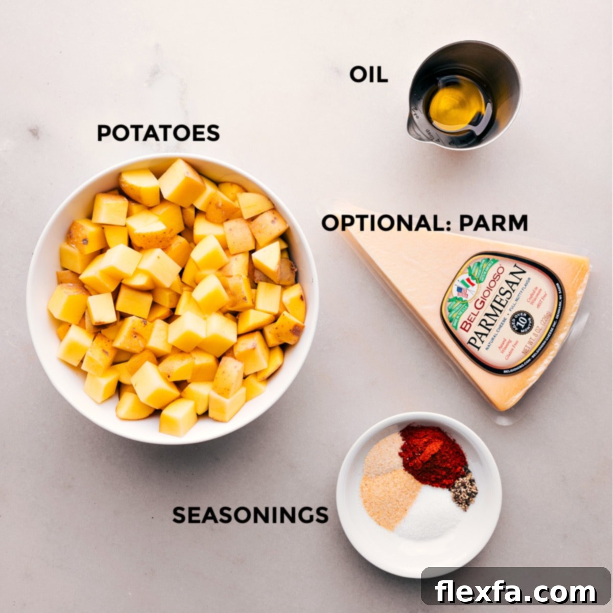 Photo of all the fresh ingredients needed for Air Fryer Breakfast Potatoes, including gold potatoes, olive oil, and various spices.