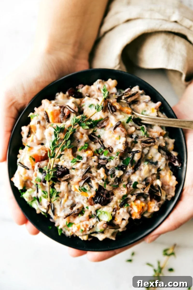 A delicious Crockpot Creamy Chicken and Wild Rice Casserole, cooked to perfection in a slow cooker, offering an easy and wholesome meal option.