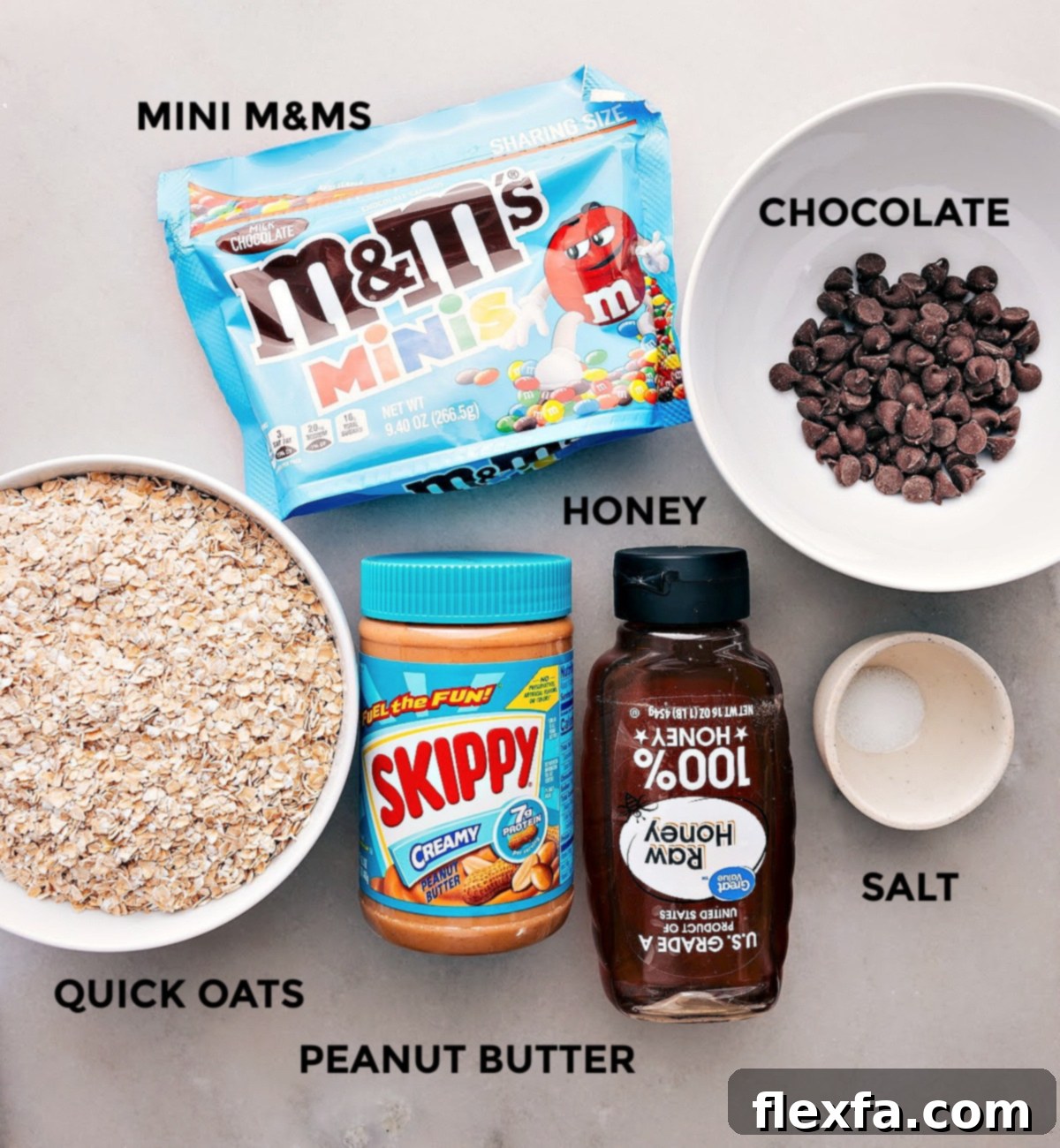 All essential ingredients for no-bake energy bars, neatly portioned and ready for mixing.