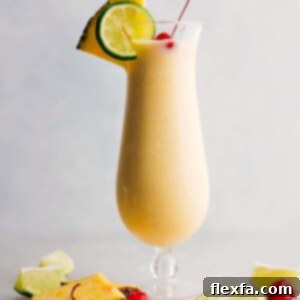 Pina Colada in a glass ready to be enjoyed.