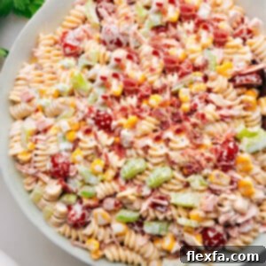 Creamy Chicken Pasta Delight 3 Chicken Pasta Salad in a bowl ready to be served, showcasing its vibrant ingredients.