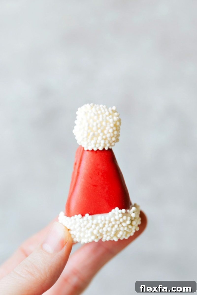 Image of the Santa hat Oreo truffle for these five Christmas Oreo cookie truffles