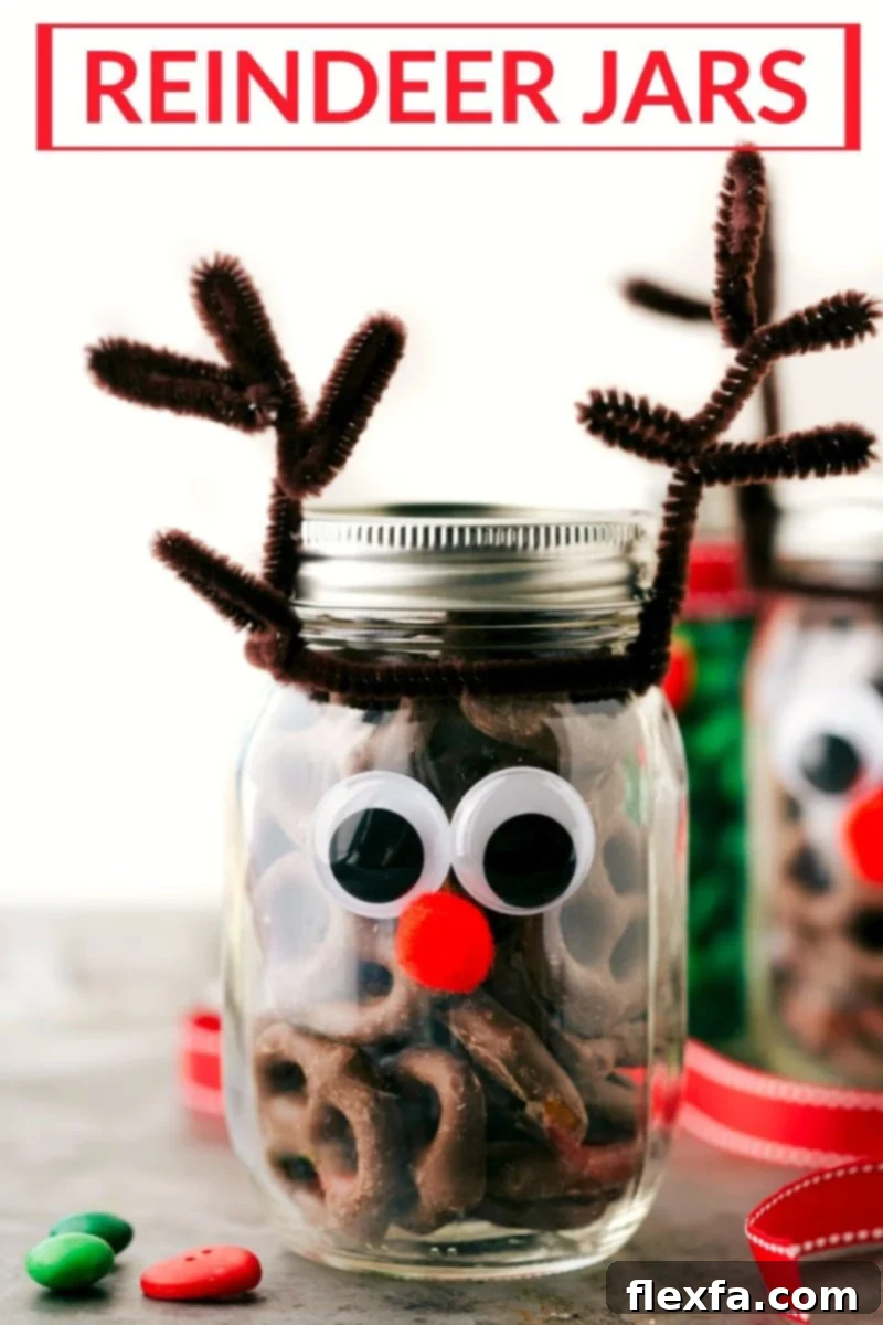Adorable Reindeer-themed Christmas Mason Jars, filled with chocolate-covered pretzels and decorated with pipe cleaner antlers, googly eyes, and red pom-pom noses.