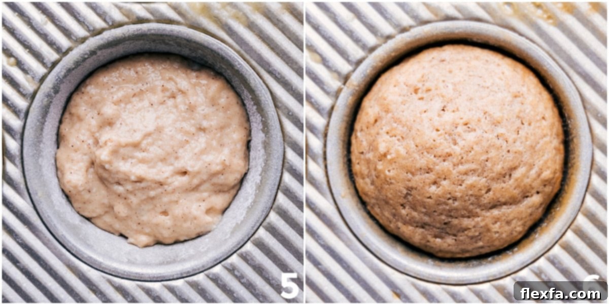 A batch of freshly baked applesauce muffins cooling in a pan.