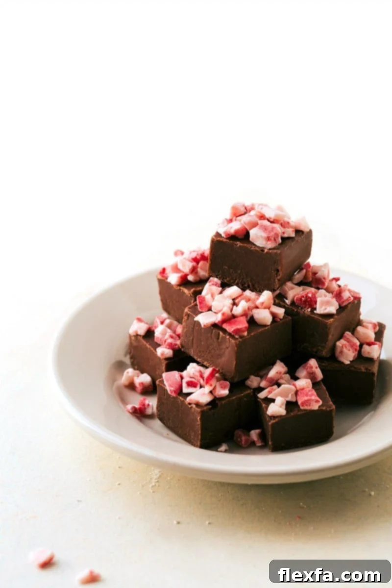 Foolproof Microwave Fudge – an easy and quick Christmas treat for festive indulgence A tantalizing image of Foolproof Microwave Fudge, a simple and rich Christmas treat